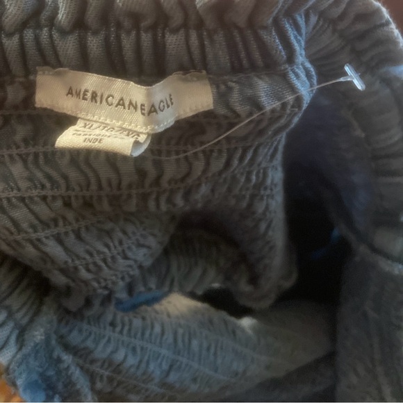 Women’s blue denim mini dress. Never worn (NWOT) hole in the back - Picture 2 of 3